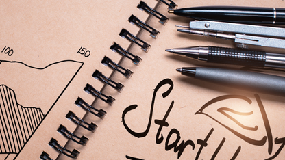 Business start-up booklet with pens